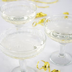 champagne coupe with etched flowers