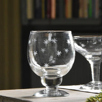 red wine glass with etched stars